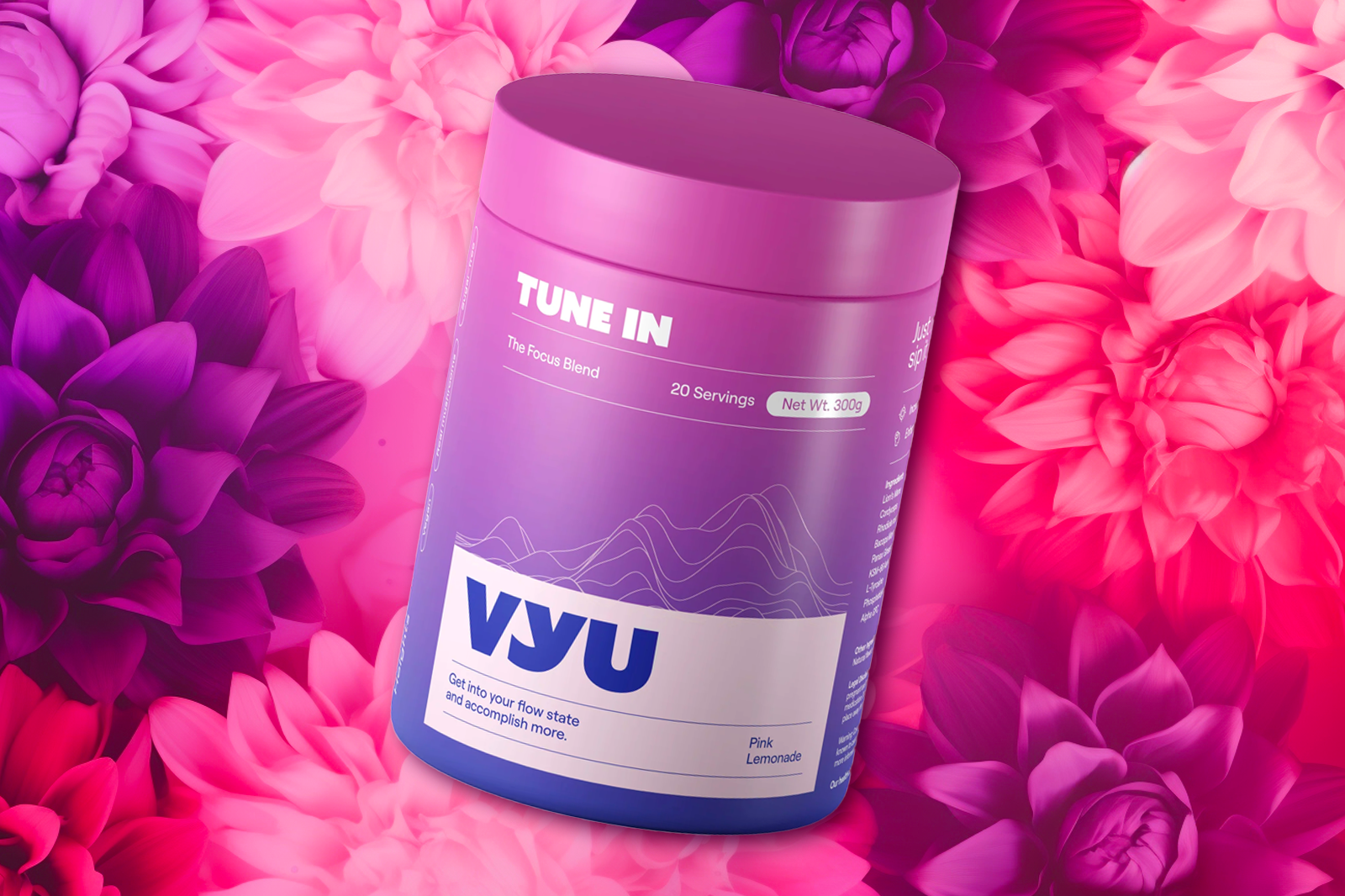 A container of VYU TUNE IN with Pink Lemonade flavor is placed against a multicolored flower background